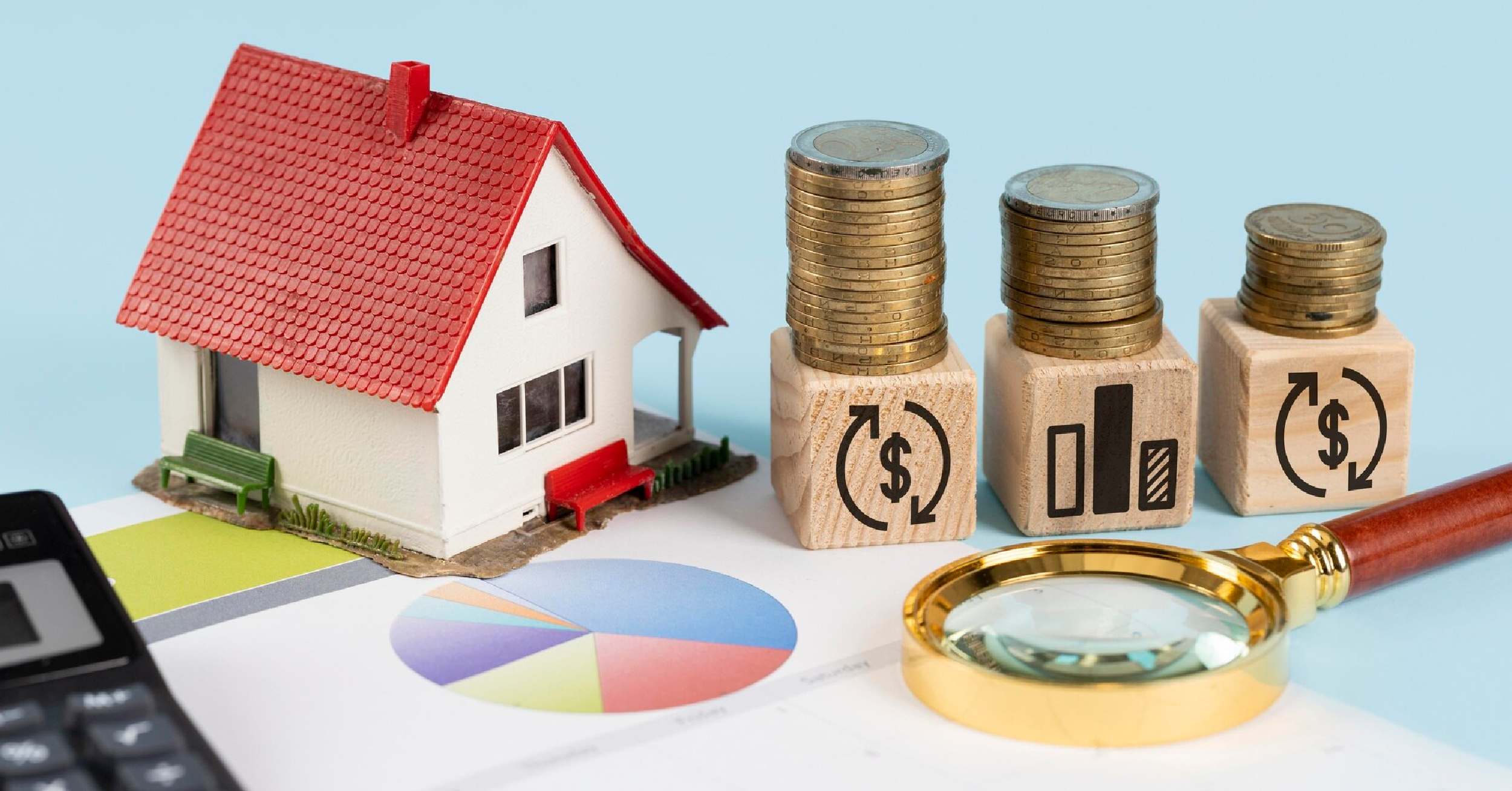 Home, coins, magnifying glass: home loan financing.